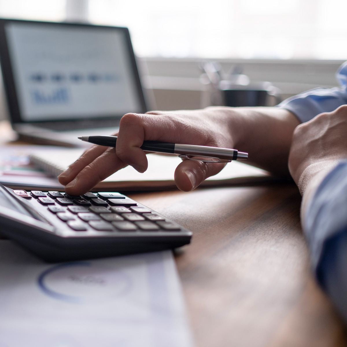 Hands to calculator | Shippers insurance coverage