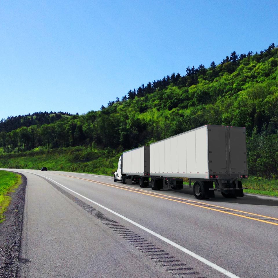 Semi-truck with two trailers