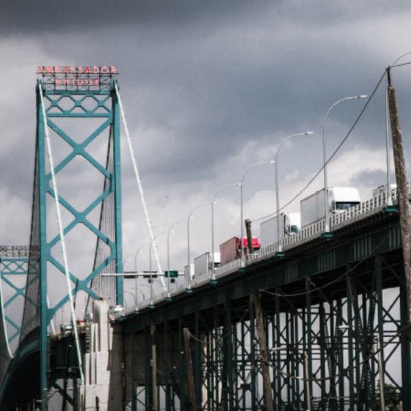 Trucks going over a Canadian bridge